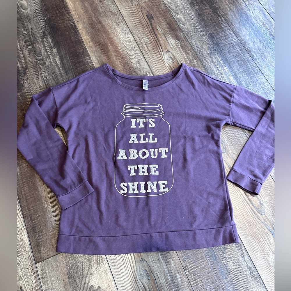 Moonshine size large top, bought at Ole Smoky in Tennessee.